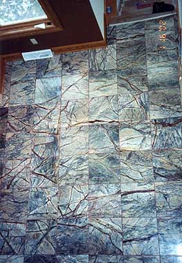 16x16 inches Marble Tile installed on Foyer Floor.